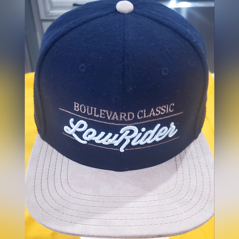 Adjustable unisex hat purchased at a Lowrider Carshow, lightly used.